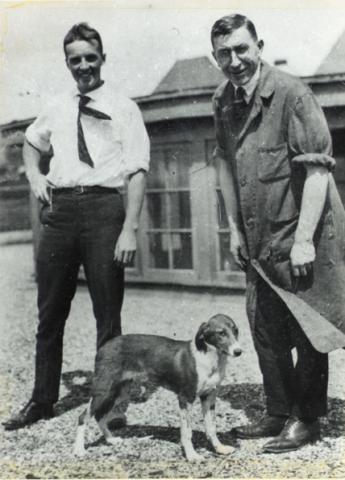 (Photograph of F. G. Banting and C. H. Best with a dog on the roof of the Medical Building (Photograph of F. G. Banting and C. H. Best with a dog on the roof of the Medical Building
