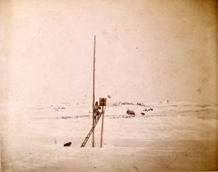 Expedition member taking readings 1884